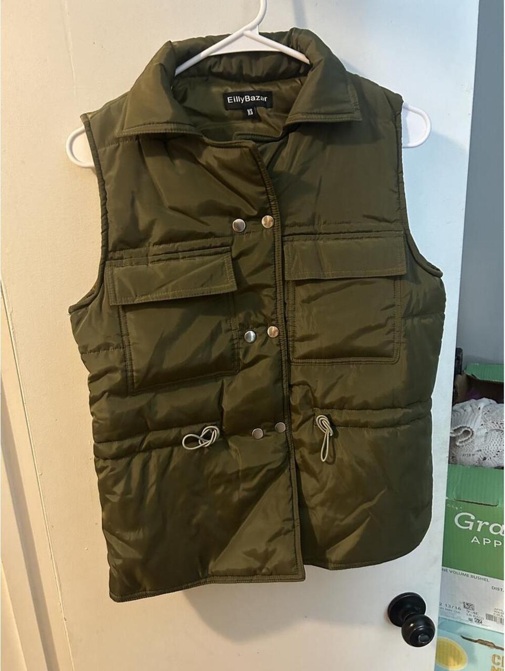 Brand new Eilly Bazar olive green puffer vest in XS